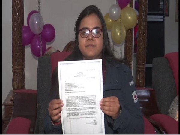 Divyangi Tripathi with the formal invitation