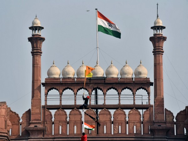 Visual of a flag waved by protesting farmers at Red Fort on January 26.