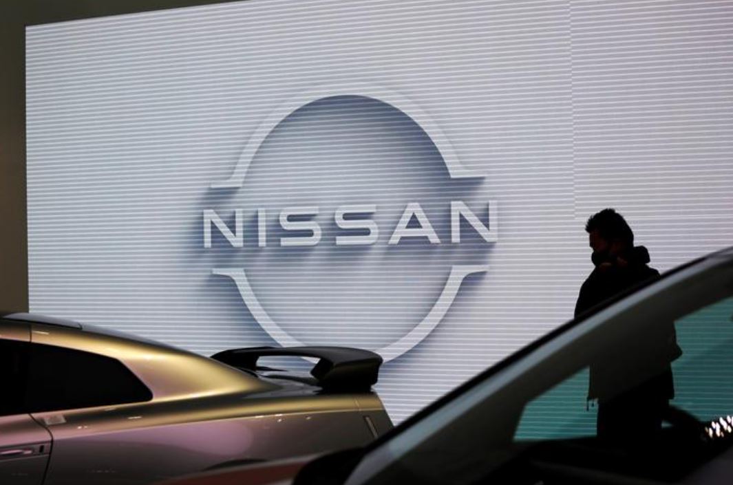 A visitor is seen at Nissan Motor Corp.'s showroom in Tokyo