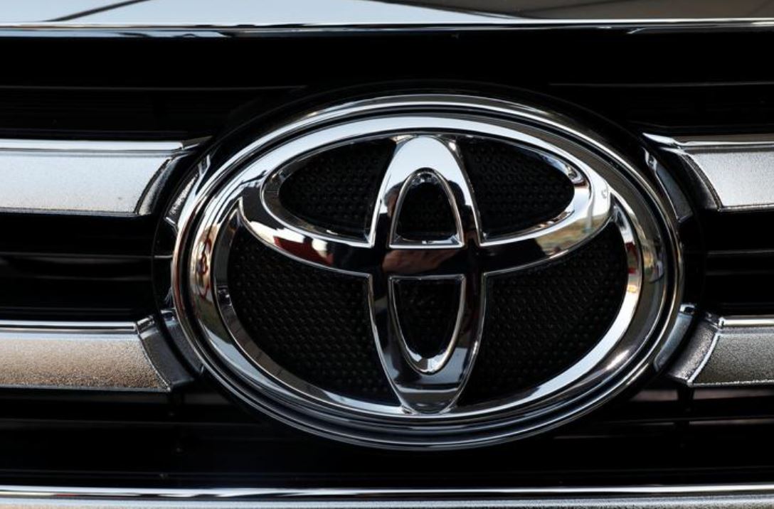 A Toyota Motor Corp. logo is seen on a car at the International Auto Show