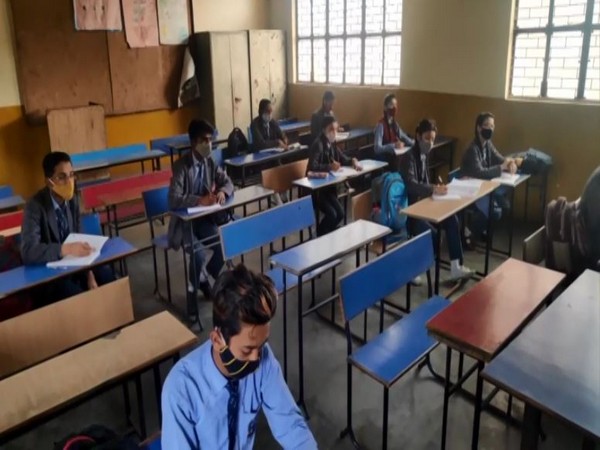 Students attend classes at a Moradabad school after schools in Uttar Pradesh reopened for classes 6 to 8 on Wednesday.