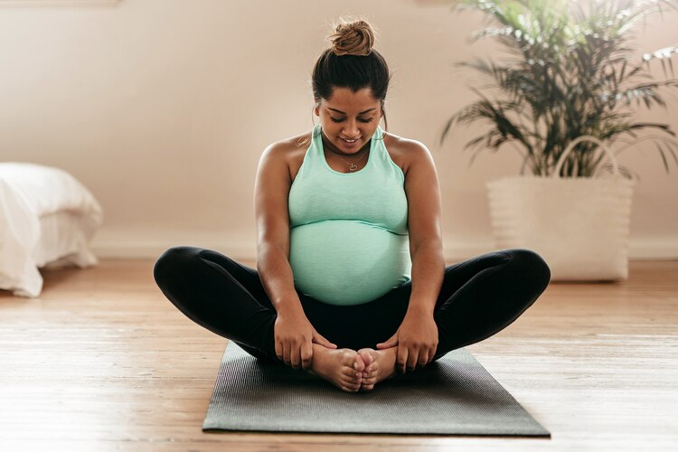 Woman exercising during pregnancy