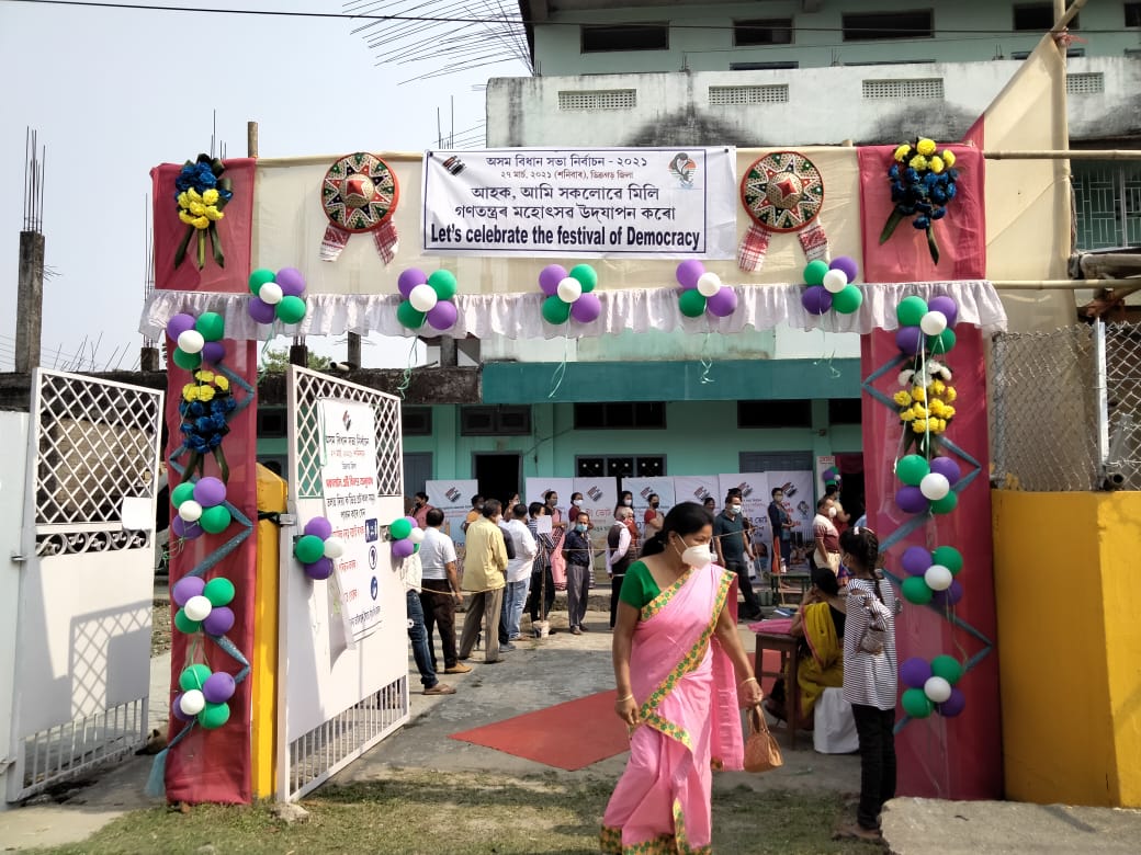 People Standing in queue to cast their vote