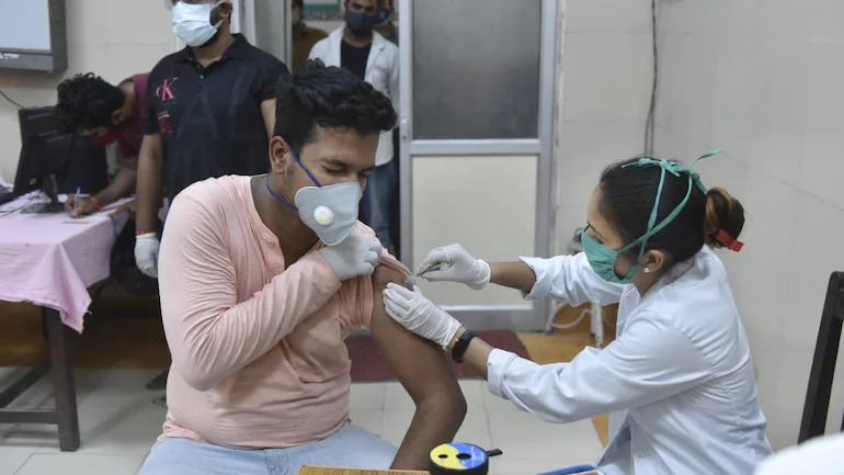 A boy getting vaccinated