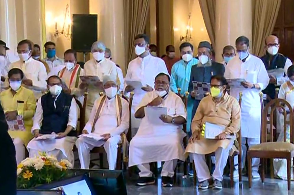 TMC leaders taking oath at Raj Bhavan in Kolkata.