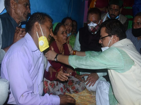 Uttarakhand Chief Minister Pushkar Singh Dhami meeting families of the people who died following a cloudburst.