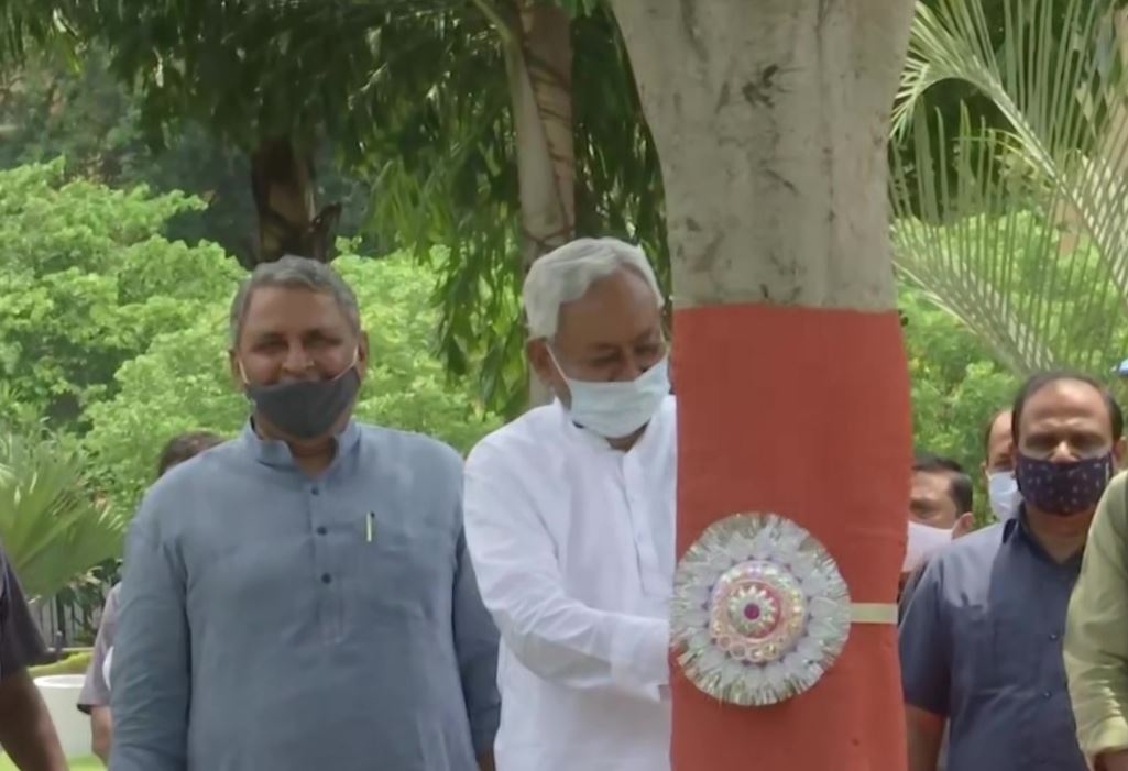 Bihar CM Nitish Kumar ties rakhis to trees