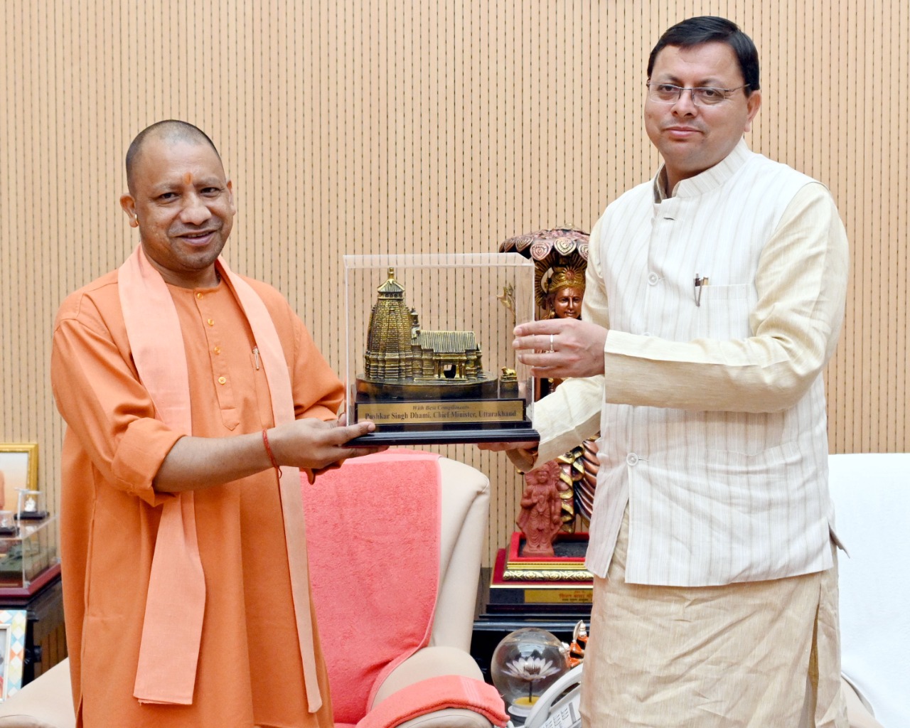 Uttarakhand Chief Minister Pushkar Singh Dhami  and Uttar Pradesh counterpart Yogi Adityanath