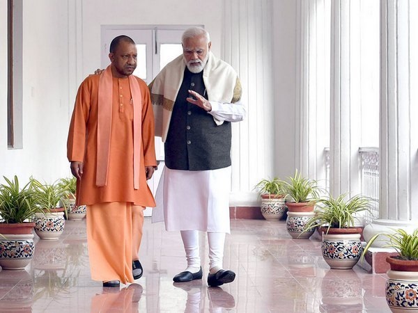 UP Chief Minister Yogi Adityanath with PM Narendra Modi