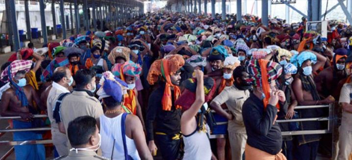 Police allow pilgrims to enter the shrine after sanitization