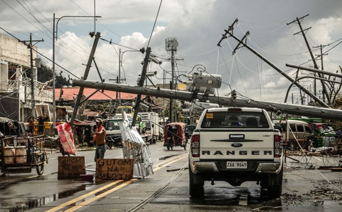 Roads were blocked by uprooted trees and lamp posts