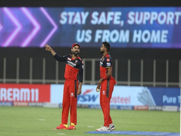 Virat Kohli with Mohammed Siraj