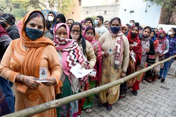 People standing line to caste their vote