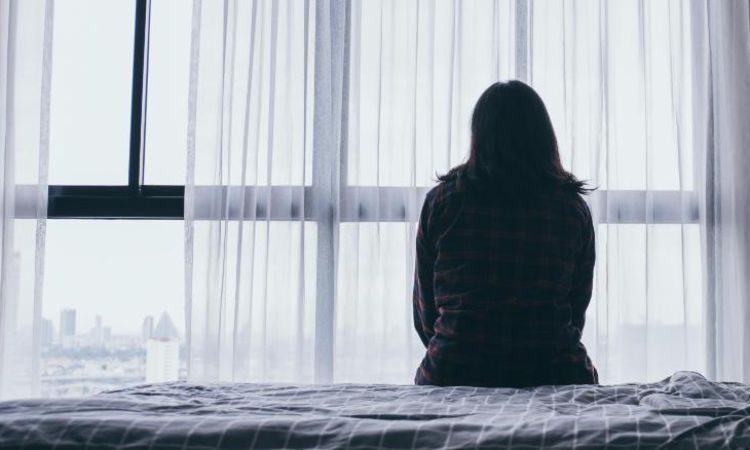 A girl sitting alone (File Photo)