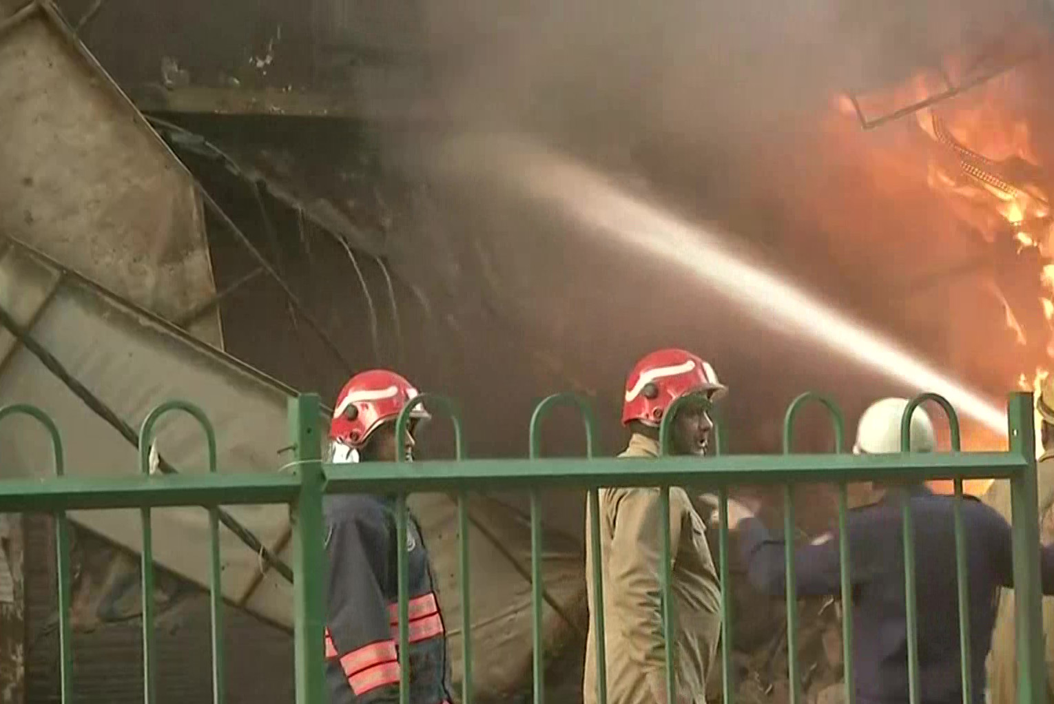 Fire tenders dousing fire in Azad market, Delhi