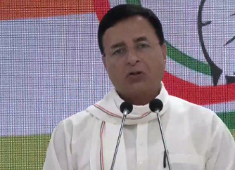 Congress general secretary Randeep Singh Surjewala addressing a press conference