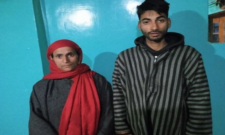 Javid, first university graduate of his community, with his mother