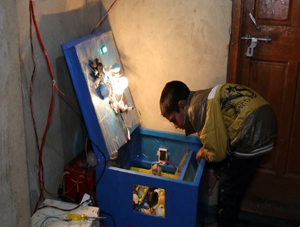 Momin Ishaq with his low-cost egg incubator