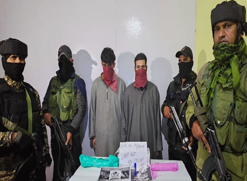 Security forces with the two accused