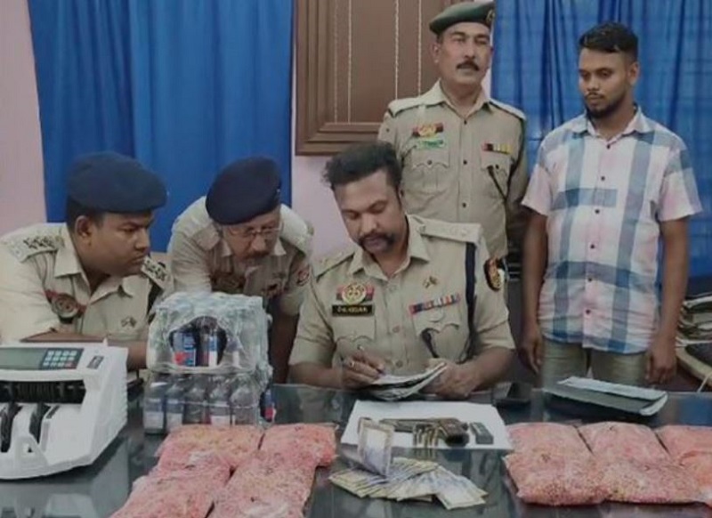 Amtali police officials with the seized narcotics