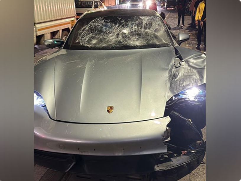 The mangled luxury car after the accident