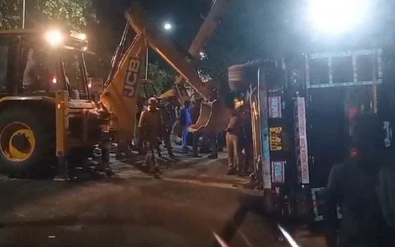 Truck overturned on a hut