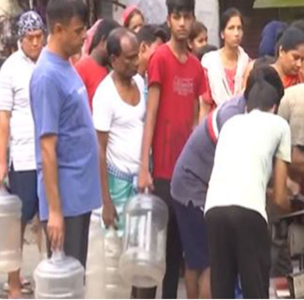 People standing in long queues