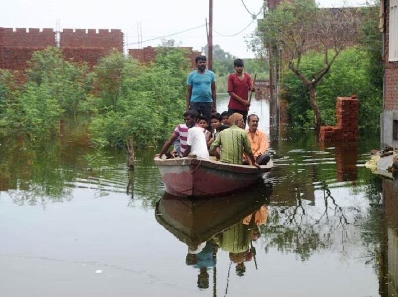 Bholanath Colony in Moradabad were seen on Sunday using boats