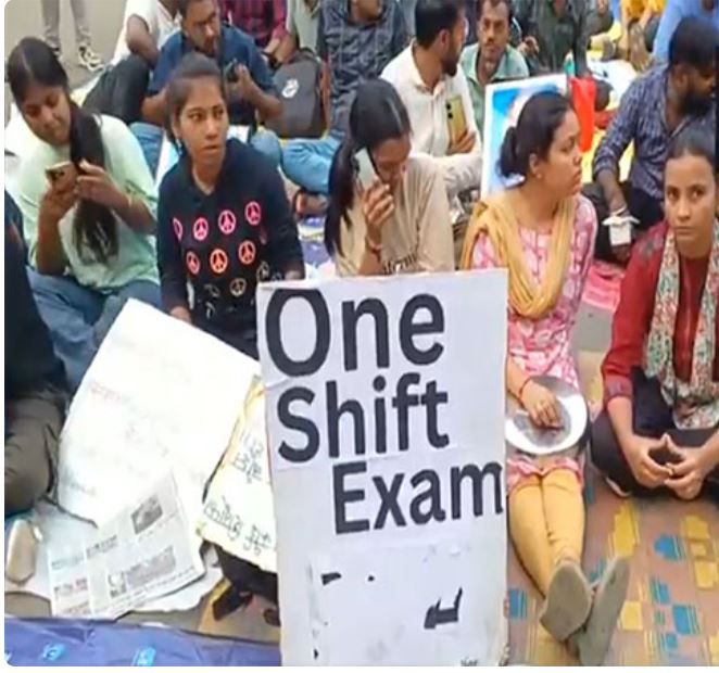 Students sit in protest against UPPSC exam date row