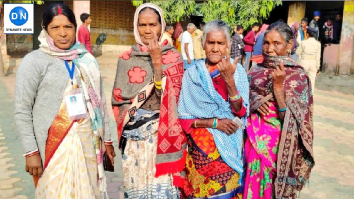 Voters show their inked fingers