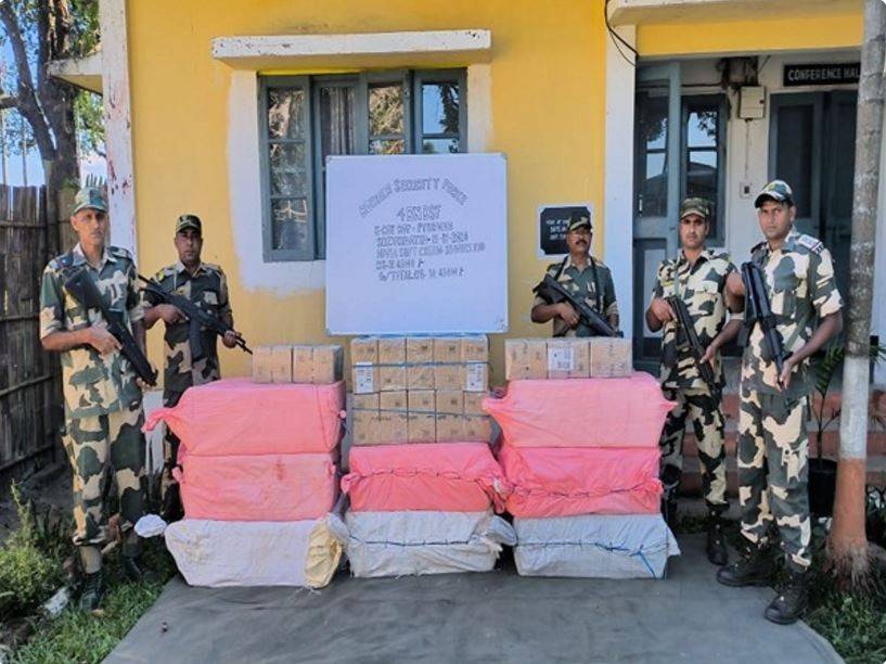 BSF personnel with the seized contraband