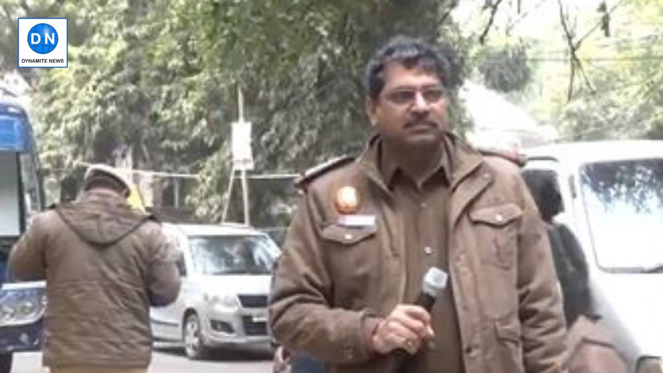 A Delhi Police personnel monitors security arrangements.