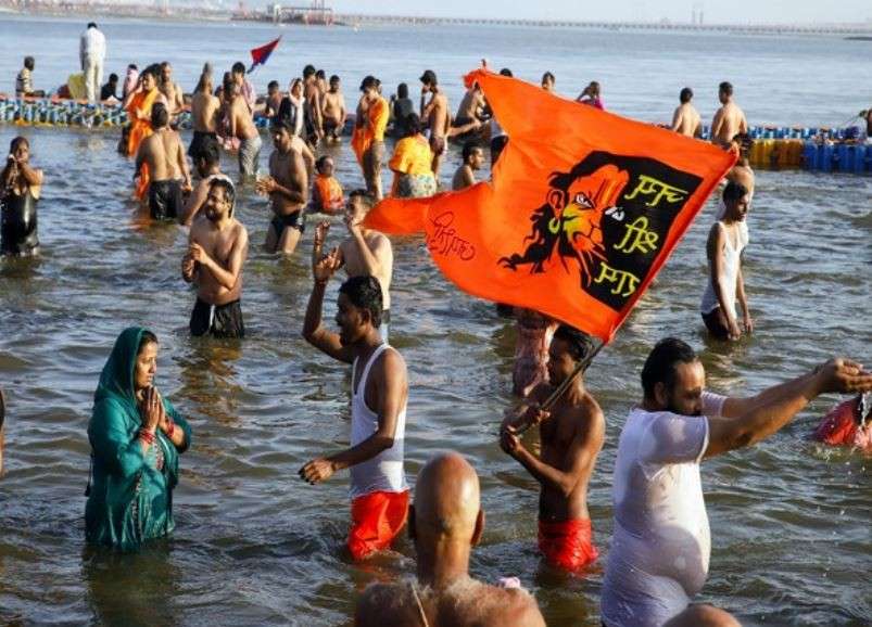 A devotee holding a 'Jai Shree Ram' flag