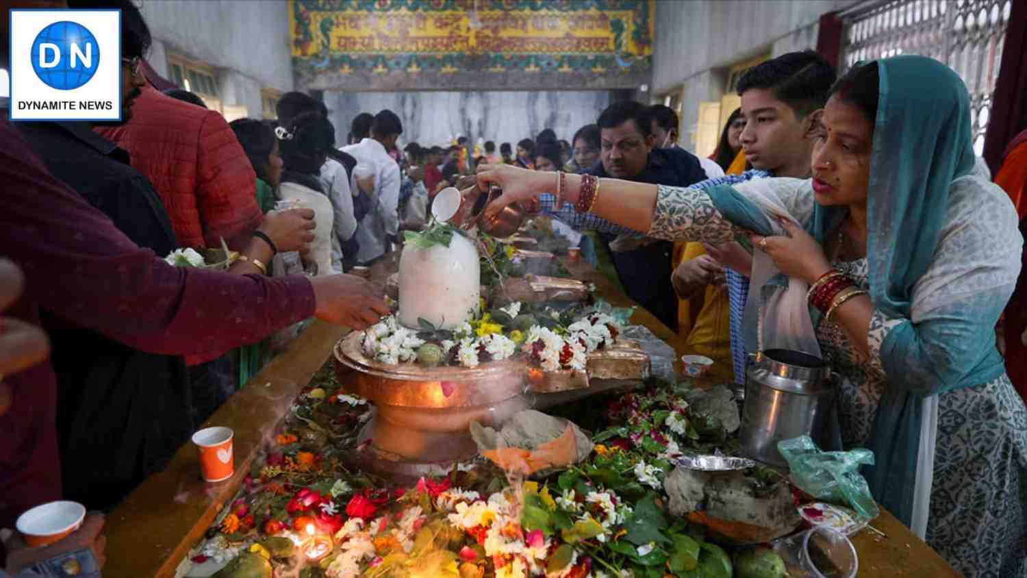 Devotees offer prayers at a Shiv Temple